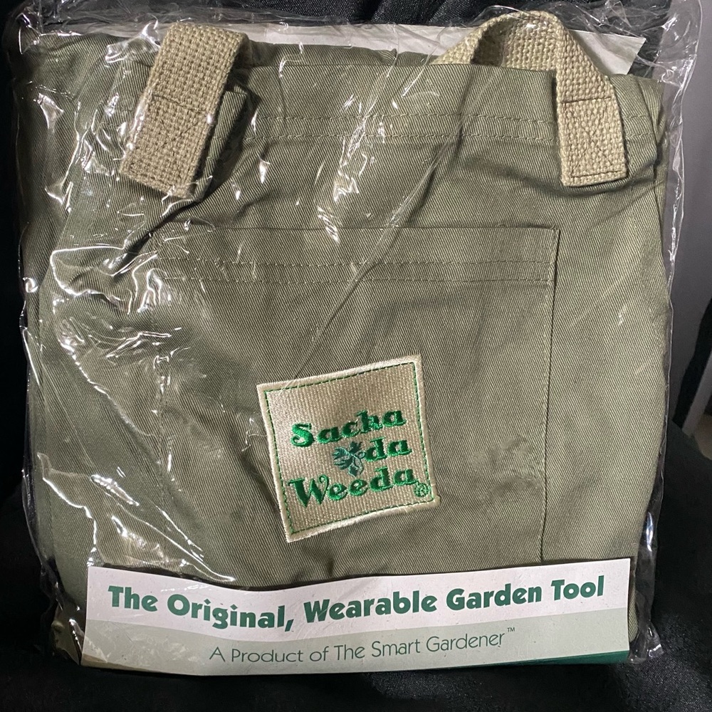 New an open package, the original wearable garden tool the gardener rosemary